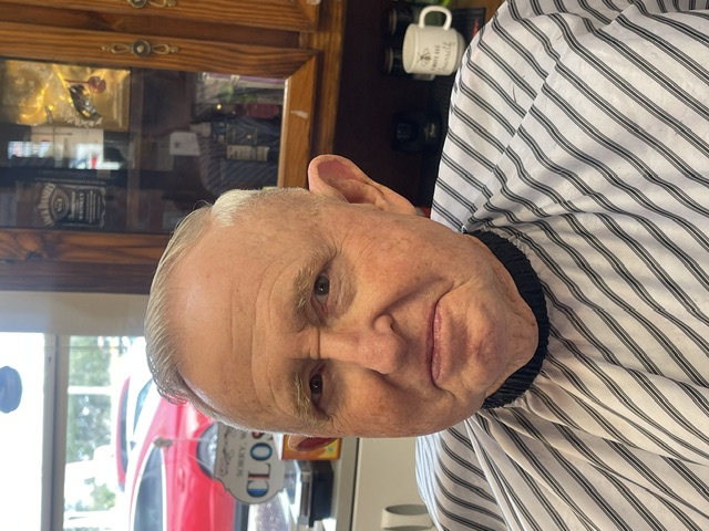 Happy customer after his haircut at James Barber Shop and Salon