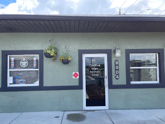 Storefront of James Barber Shop and Salon inside Creative Edge Salon